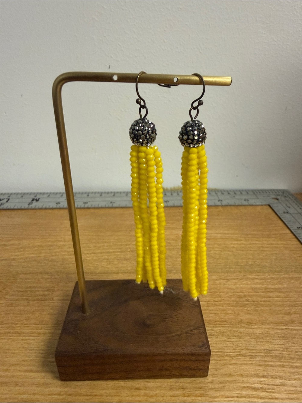 Yellow seed bead tassel earrings with rhinestone disco ball accent statement